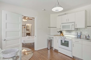 Coffee/tea maker, fridge, microwave, oven