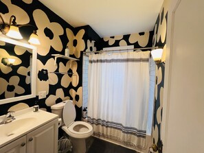 Hair dryer, towels, soap, toilet paper