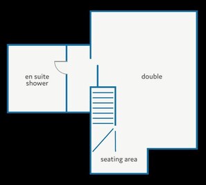 Grundriss eines Hotels mit eigenem Duschbad, Doppelzimmer und Sitzecke.