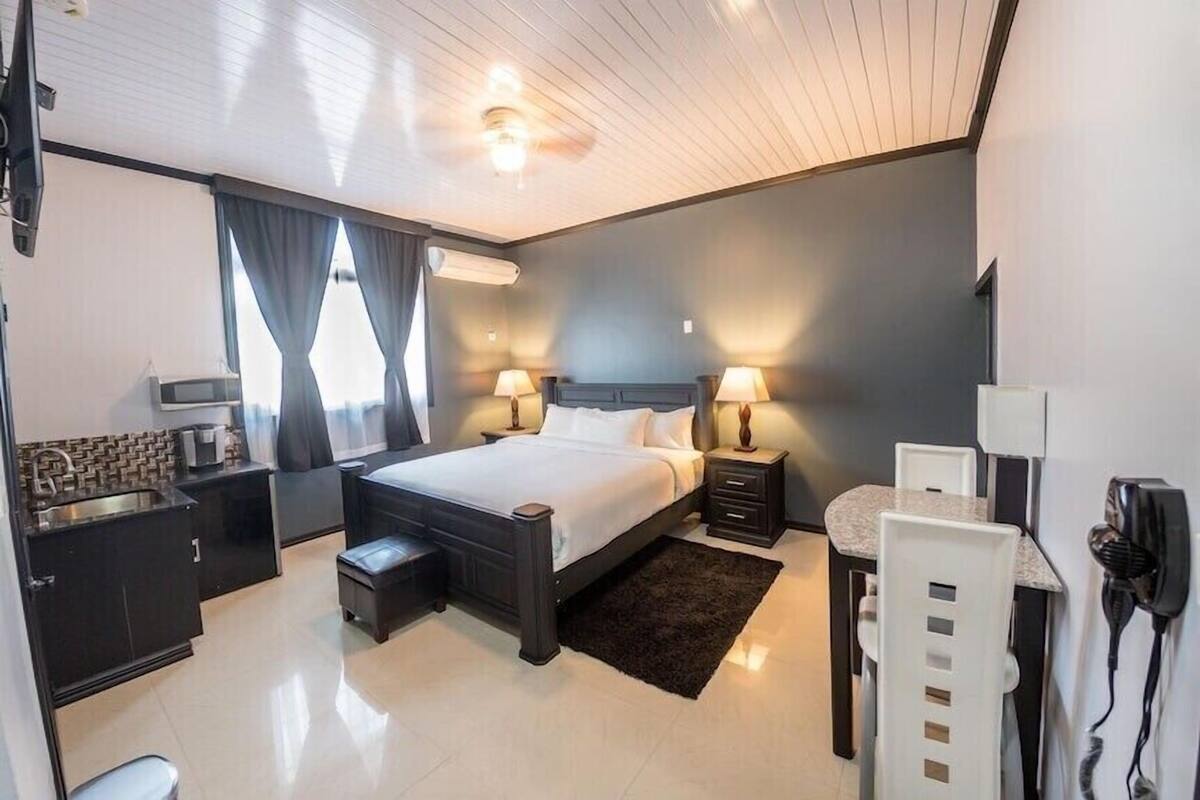 Deluxe Single Room, Balcony, City View | In-room safe, laptop workspace, blackout drapes, iron/ironing board