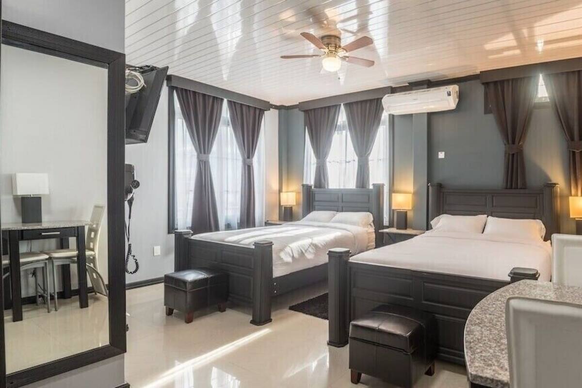 Family Room, Balcony, City View | In-room safe, laptop workspace, blackout drapes, iron/ironing board