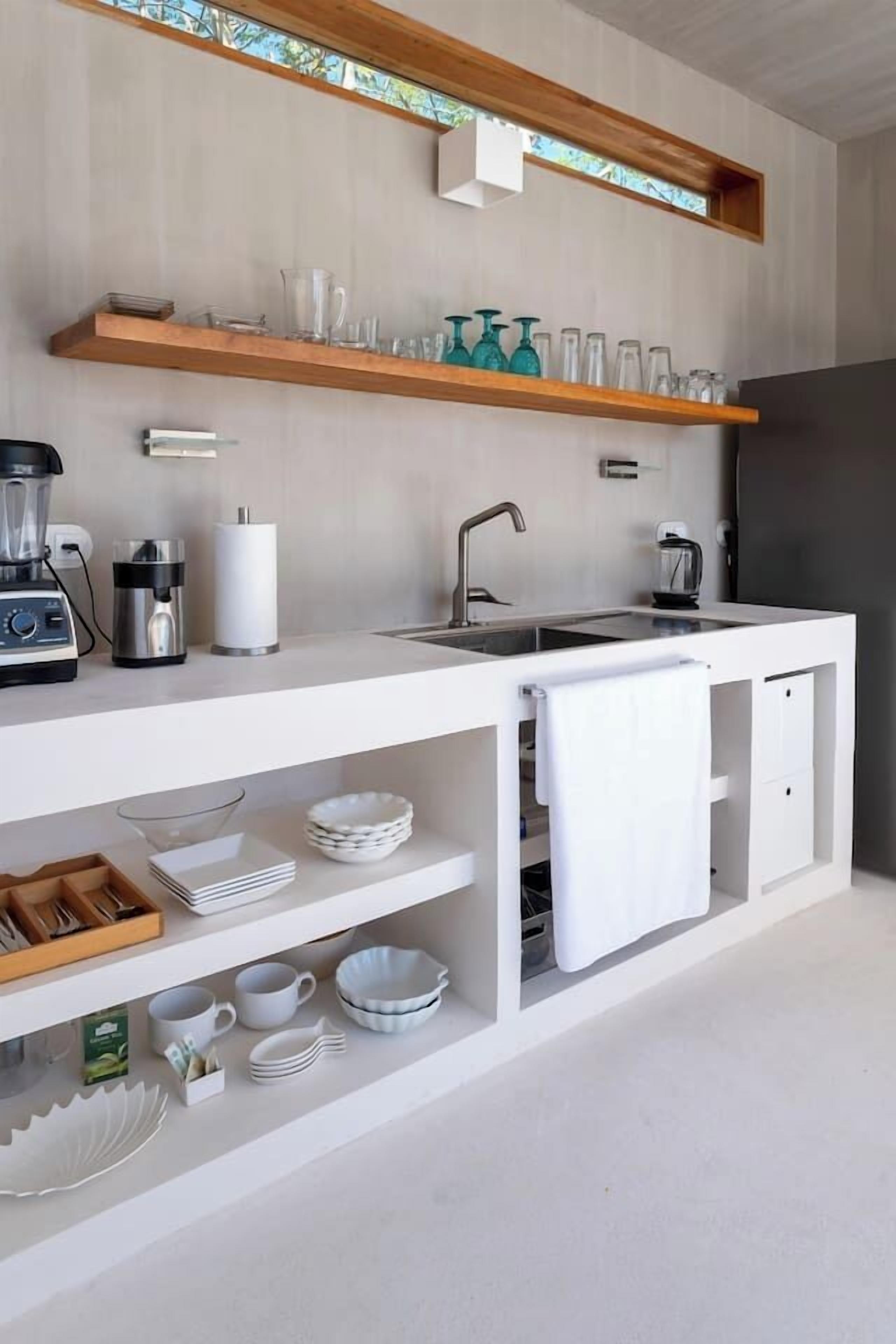 Fridge, stovetop, dishwasher, coffee/tea maker