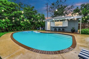Outdoor pool - Family Fun · Pool · Firepit · Games · Movie Nights (Houston)