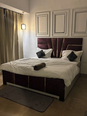 1 bedroom, iron/ironing board, Internet, bed sheets - Premium Studio Retreat at Spectrum Mall | Private Balcony & City Views (Noida)