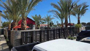 A row of mailboxes with a white van parked in front. - Spacious 4-bedroom townhome in beautiful Long Beach with AC (Long Beach)