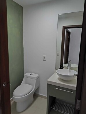 Hair dryer, towels, soap, toilet paper