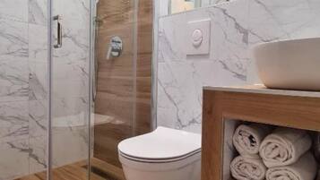 Shower, hair dryer, towels