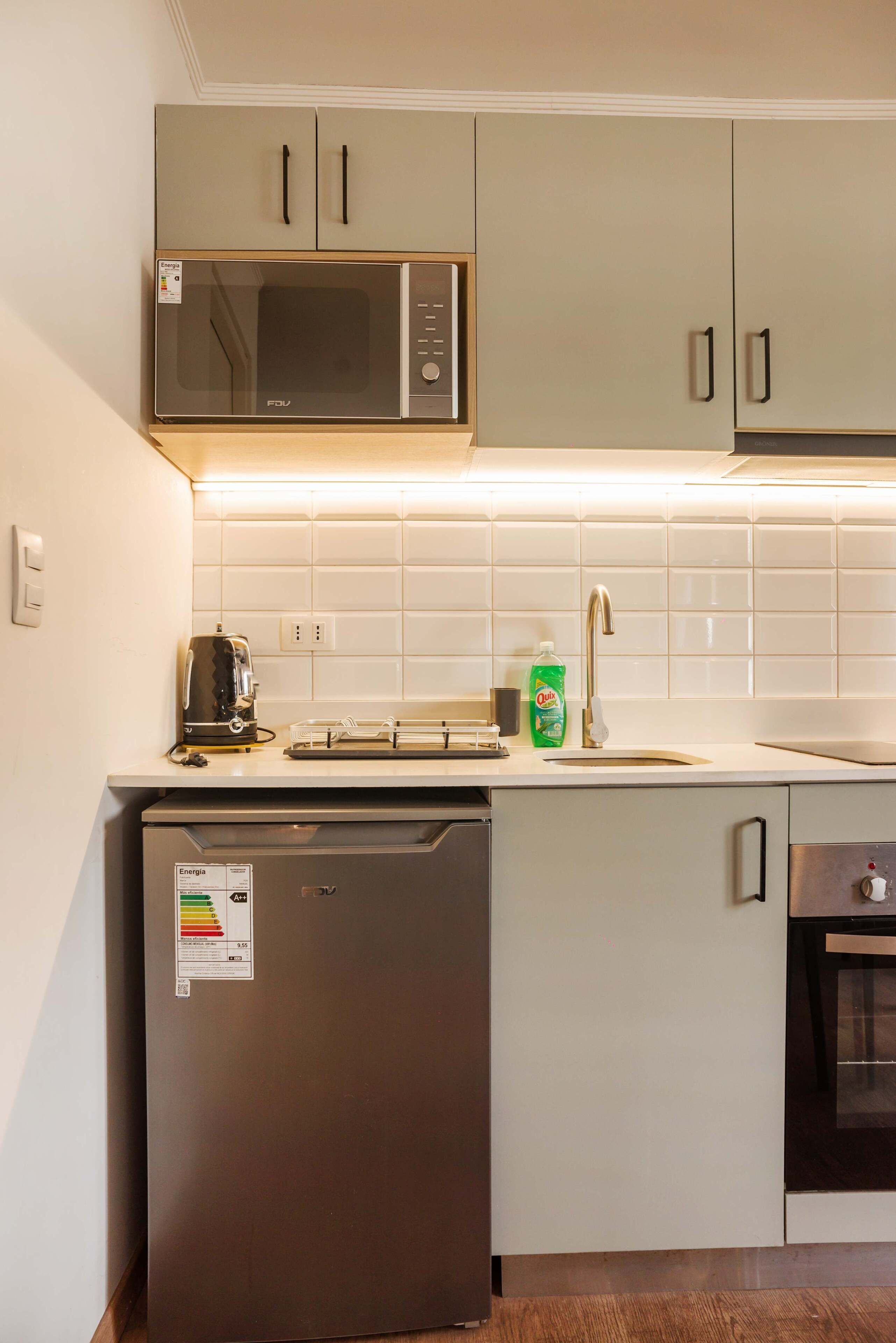 Coffee/tea maker, fridge, microwave, oven