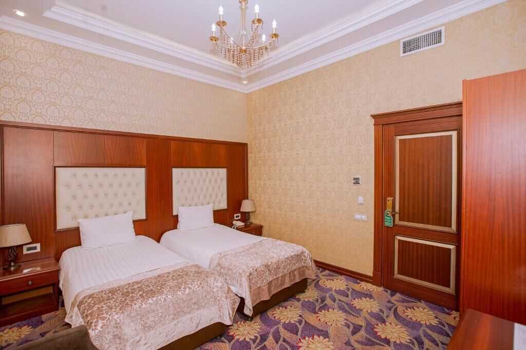 Twin Room, City View | In-room safe, desk, laptop workspace, iron/ironing board