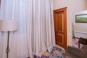 Twin Room, City View | In-room safe, desk, laptop workspace, iron/ironing board - Clover Hotel (Baku)