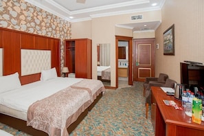 Comfort Triple Room, City View | In-room safe, desk, laptop workspace, iron/ironing board - Clover Hotel (Baku)