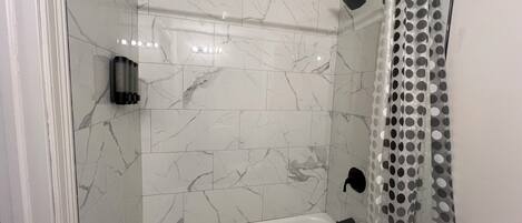 Hair dryer, towels, soap, toilet paper