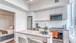 Coffee/tea maker, fridge, microwave, oven