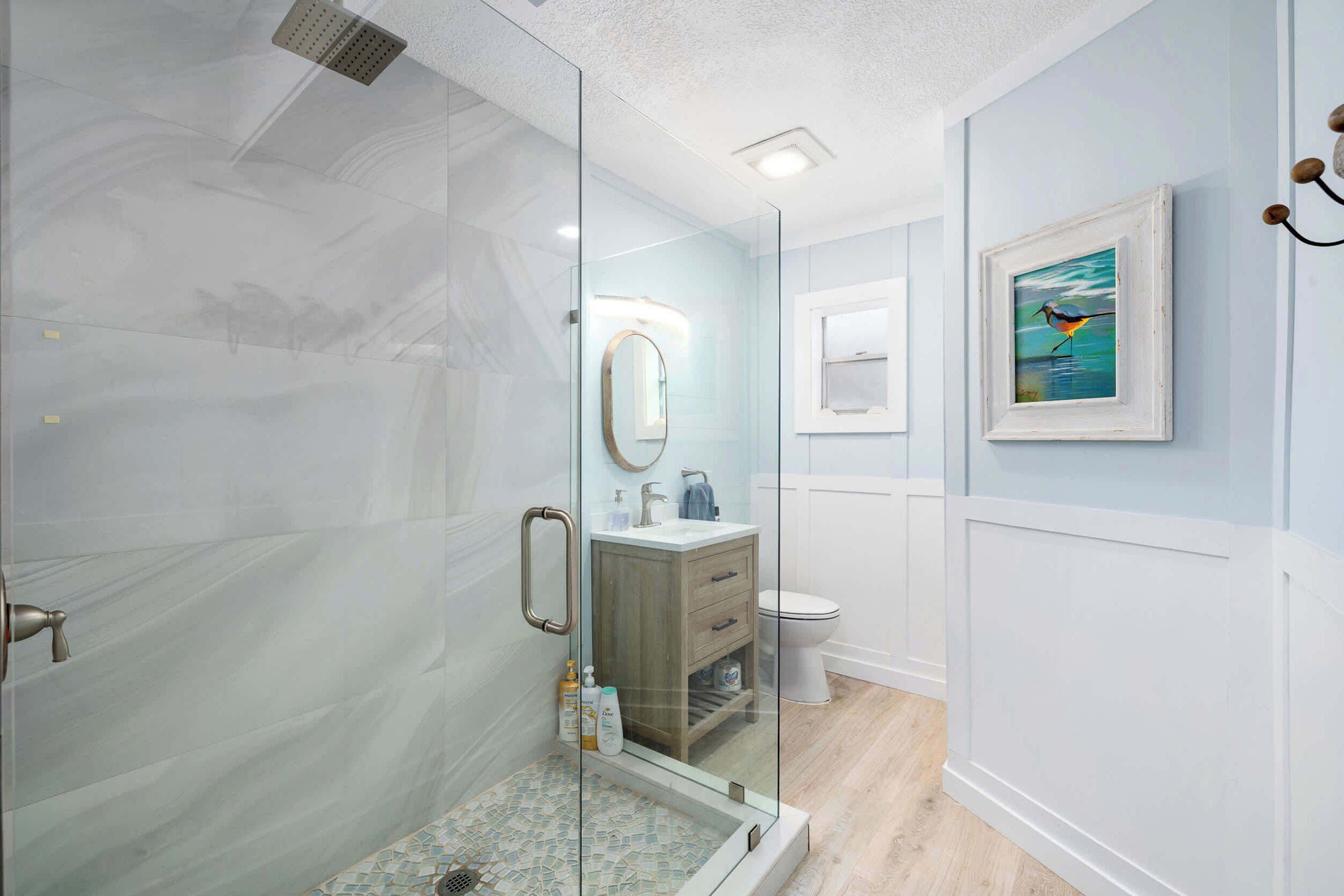 Shower, hair dryer, towels, shampoo