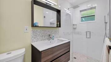Comfort Room | Bathroom | Shower, towels, soap, shampoo