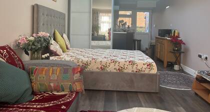 Cosy self contained en suit extension with skylight and garden view