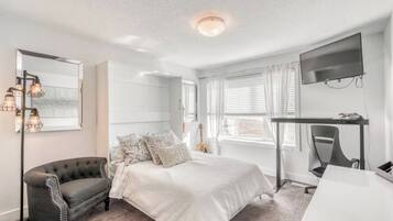 2 chambres, fer et planche à repasser, Wi-Fi, draps fournis