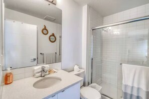 Shower, hair dryer, towels, soap