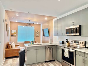 Coffee/tea maker, fridge, microwave, oven - Chic City Retreat Modern Condo in Old Fourth War (Atlanta)
