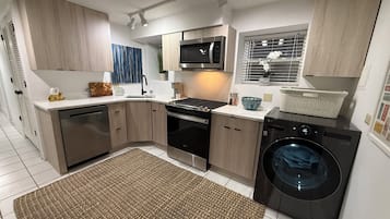 Coffee/tea maker, fridge, microwave, oven