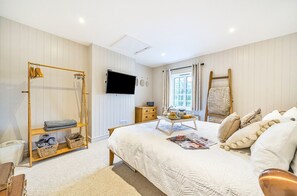 2 dormitorios, tabla de planchar con plancha, cuna de viaje y wifi