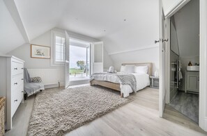 3 bedrooms, iron/ironing board, travel cot, WiFi - Seacote: Family Seafront Home in Selsey – Sleeps 7, Hot Tub & Sea Views (Selsey)