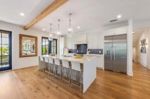 Fridge, microwave, oven, stovetop - A Shore Thing: On Canal! Pool Spa!  Rooftop Deck by Anna Maria Life Vacation Rentals (Anna Maria)