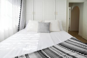 Fer et planche à repasser, draps fournis