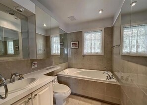 Jetted tub, hair dryer, towels, soap