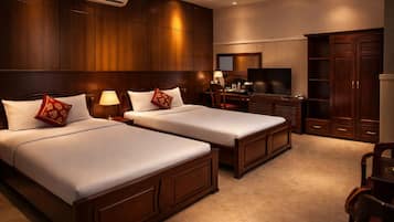 Family Room | Free minibar items, desk, laptop workspace, blackout curtains