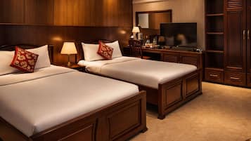 Family Room, 2 Queen Beds | Free minibar items, desk, laptop workspace, blackout drapes