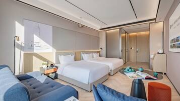Family Triple Room, Partial Lake View | Desk, laptop workspace, blackout drapes, soundproofing