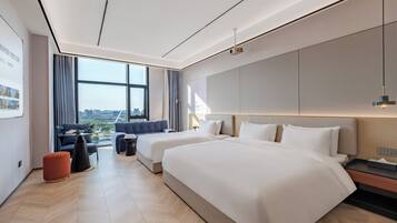 Family Triple Room, Partial Lake View | Desk, laptop workspace, blackout curtains, soundproofing