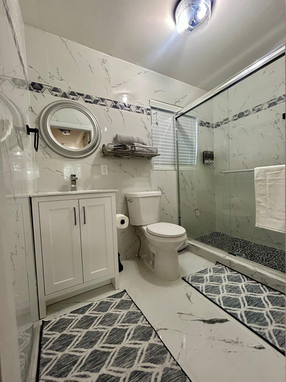 Shower, towels, soap, toilet paper
