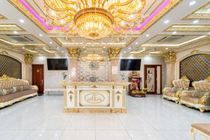 A luxurious lobby with a grand chandelier, ornate decor, and plush seating areas. - Townhouse District 10 Near Children Hospital 1 (Ho Chi Minh Municipality)