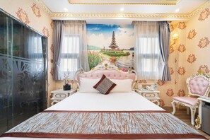 A spacious bedroom with a large bed, a decorative headboard, and a mural of a pagoda. - Townhouse District 10 Near Children Hospital 1 (Ho Chi Minh Municipality)