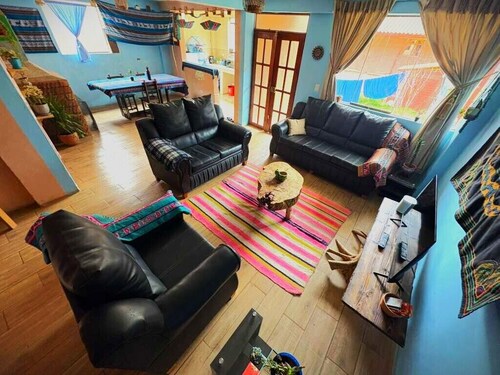 Enjoy a private room with breathtaking views of the Pisac mountains.