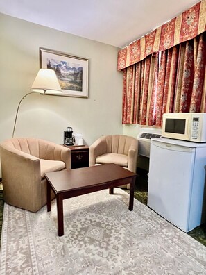 Standard Room, 1 King Bed | Living area - Rocky Mountain Lodge & Suites (Renfrew)