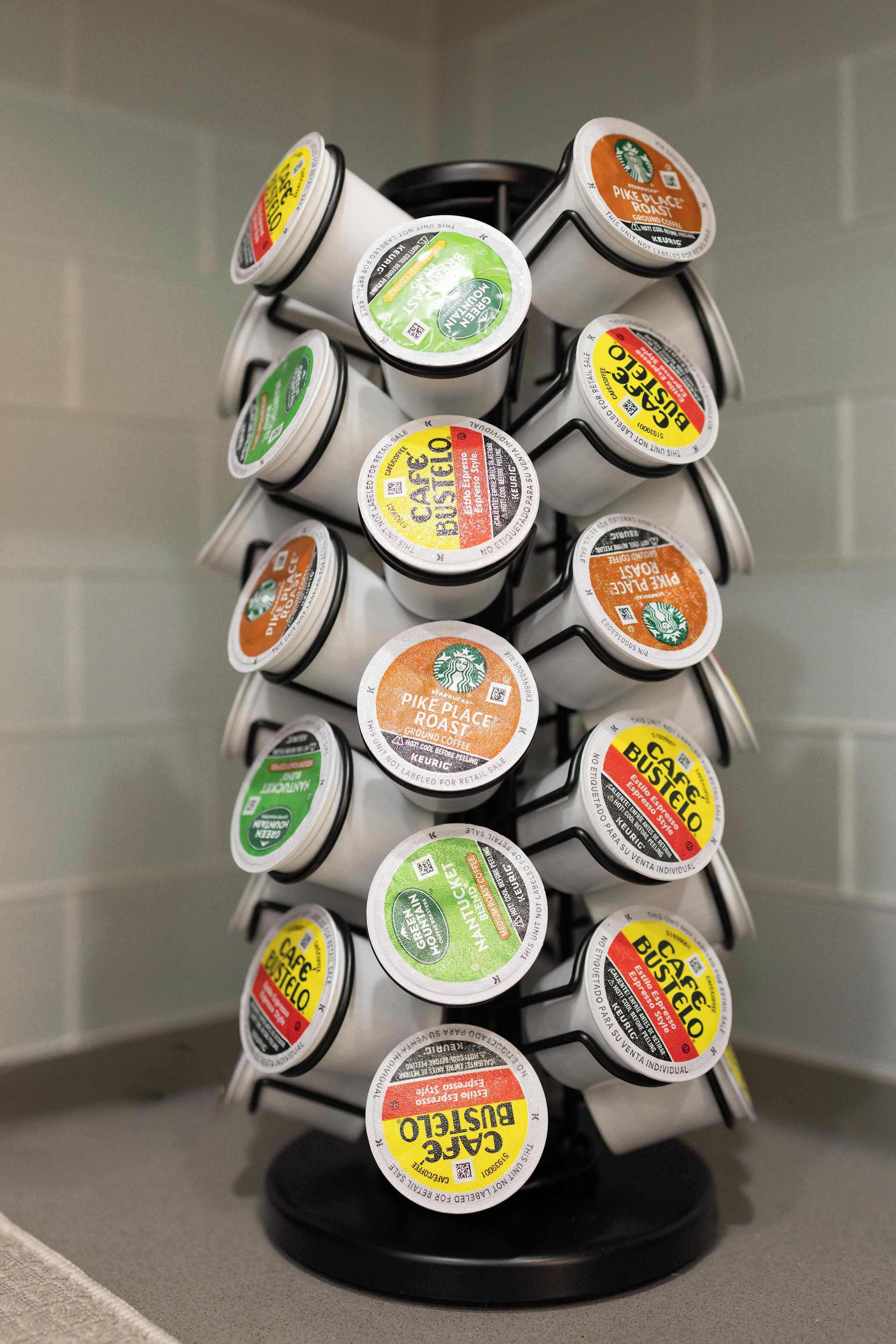A coffee machine with multiple coffee pods arranged in a circular holder.