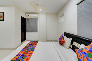 华丽客房 | 埃及棉床单、高档床上用品、客房内保险箱、免费 WiFi