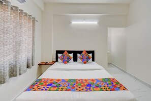 Deluxe Room | Egyptian cotton sheets, premium bedding, in-room safe, free WiFi - Via Wisdom (Rajgurunagar)