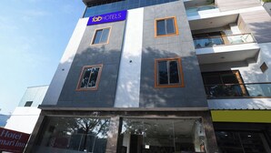 A modern building with a 'fabHOTELS' sign, multiple windows, and a visible entrance. - FabHotel Kamari Inn, Vijay Nagar (Indore)