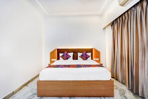 华丽客房 | 埃及棉床单、高档床上用品、客房内保险箱、免费 WiFi