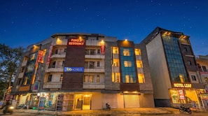A multi-story building with signs for 'PINGLA RESIDENCY' and 'HOTEL LEAF'. - Fabhotel Pingla Residency (New Delhi)