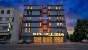 A multi-story hotel with a prominent sign reading "HOTEL CONTINENTAL A LUXURIOUS ACCOMMODATION." - FabHotel S Continental - Kachiguda Railway Station, Kachiguda (Hyderabad)