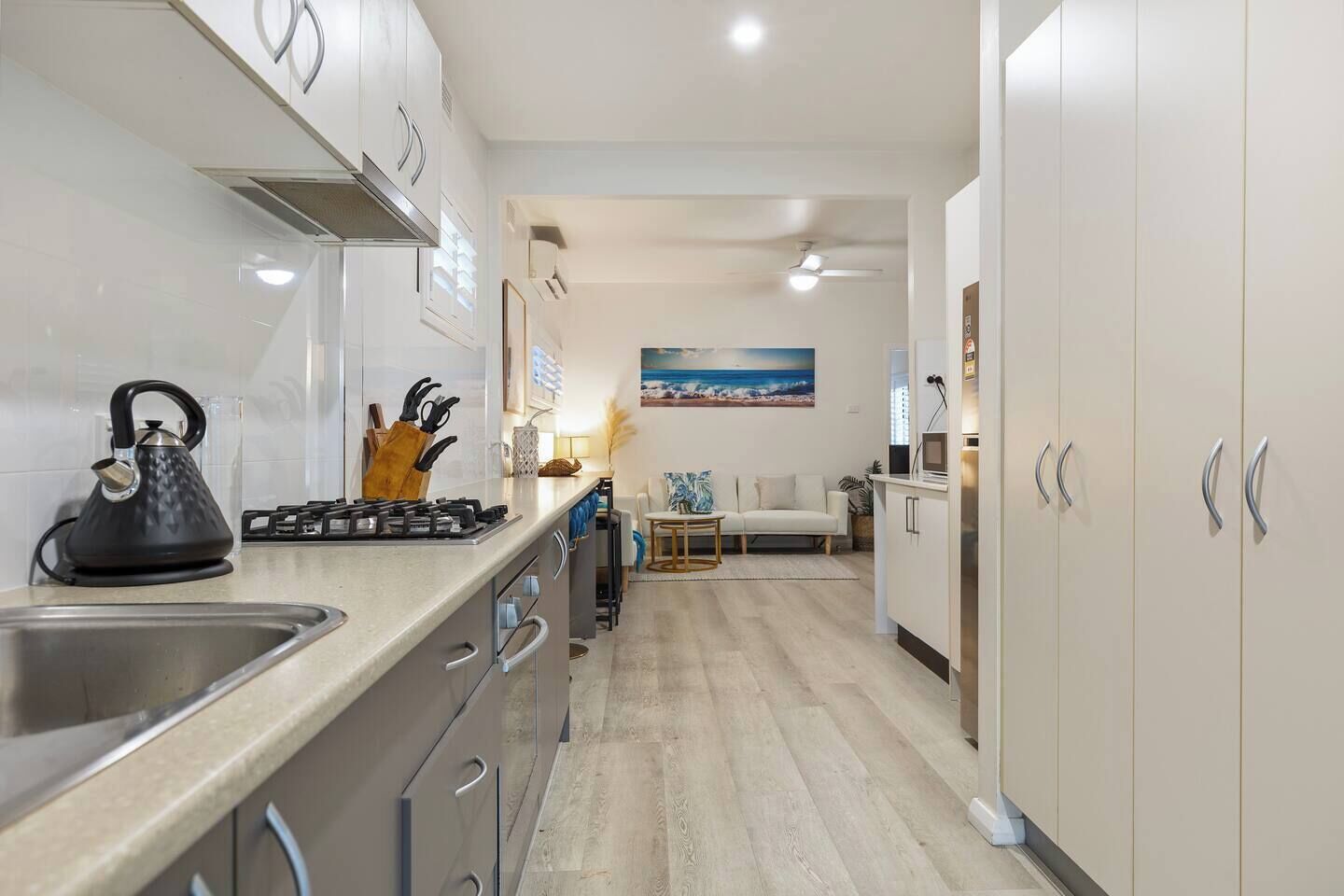 Fridge, oven, stovetop, dining tables