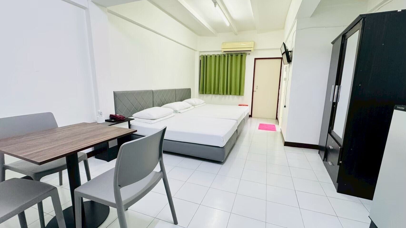 Basic Triple Room, 3 Twin Beds, Balcony, City View | Free WiFi, bed sheets