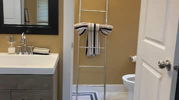 Shower, towels, soap, toilet paper