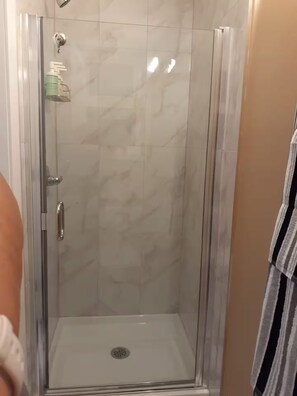 Shower, towels, soap, toilet paper - Small, renovated, private 1 bedroom bathroom in front of bus stop to downtown. (Vancouver)