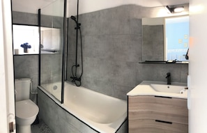 Hair dryer, towels, soap, toilet paper